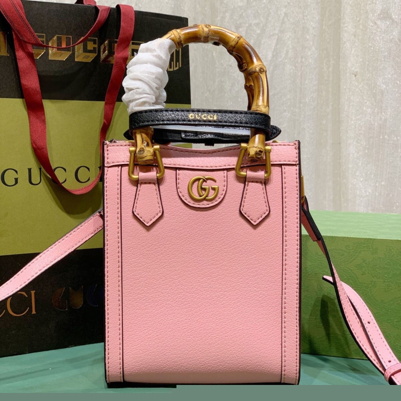 G*u*i top handle bags